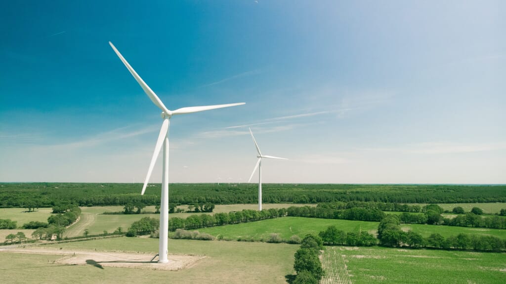 wind farm against blue sky