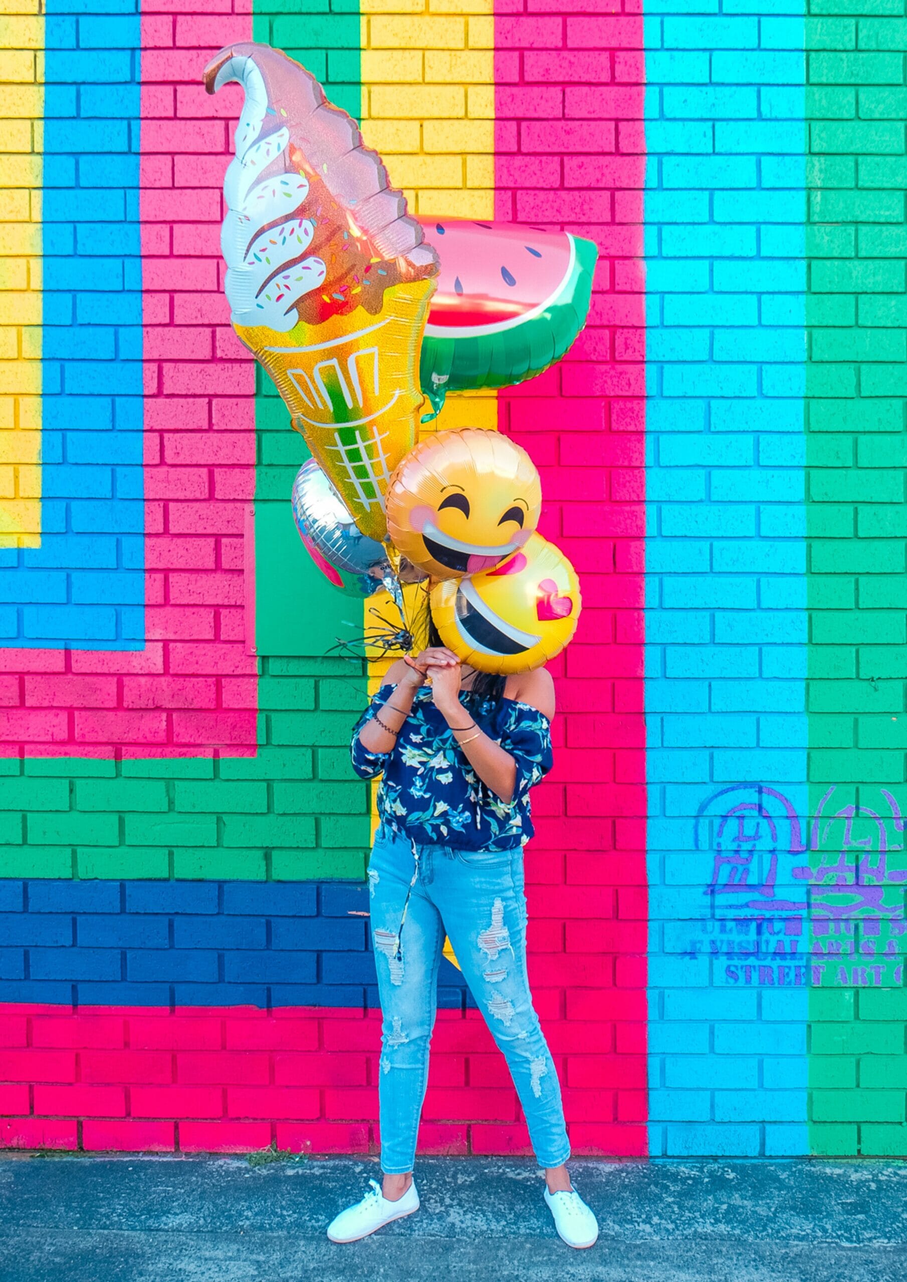 person holding balloons