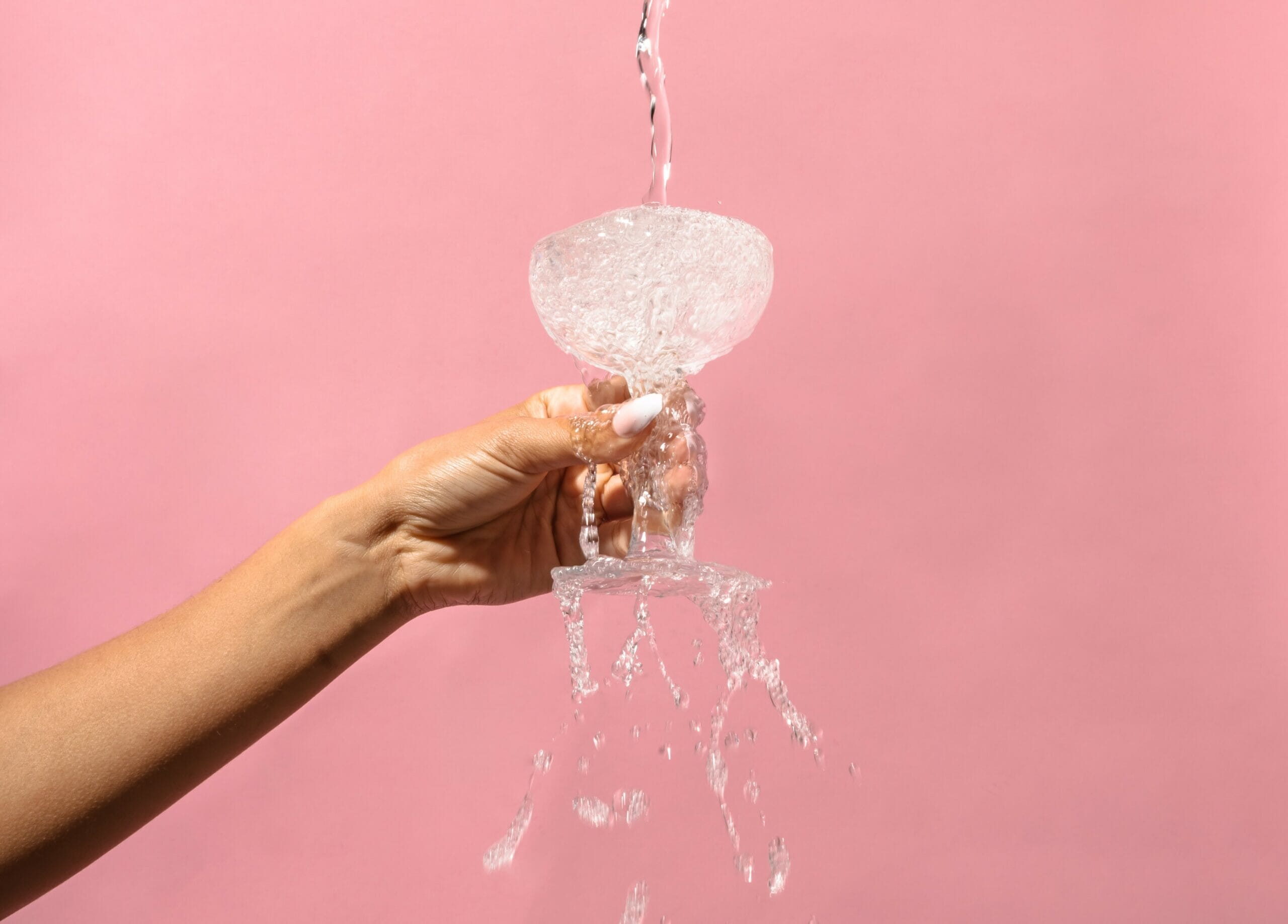 glass overflowing with water