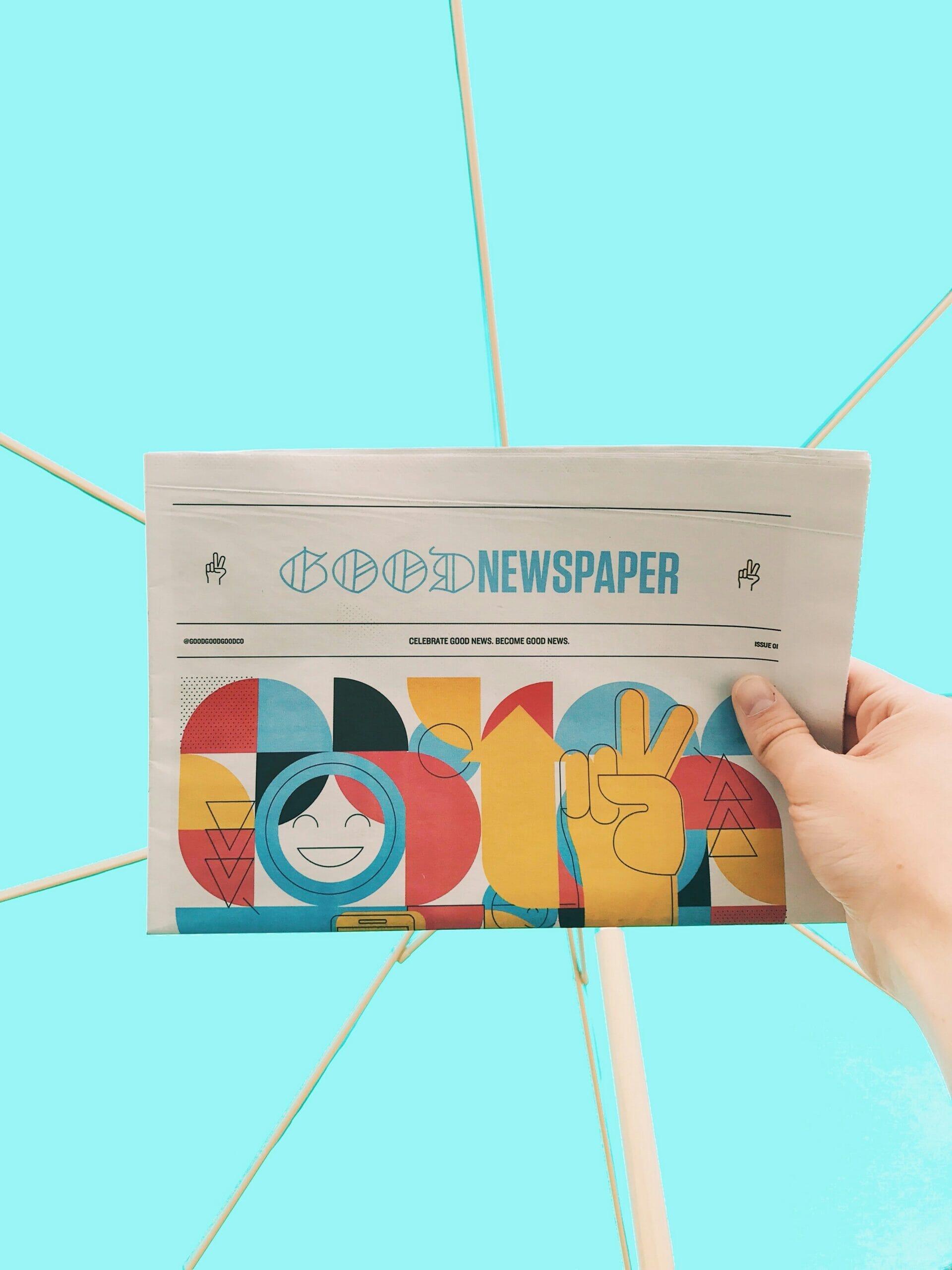 newspaper-on-blue-scaled