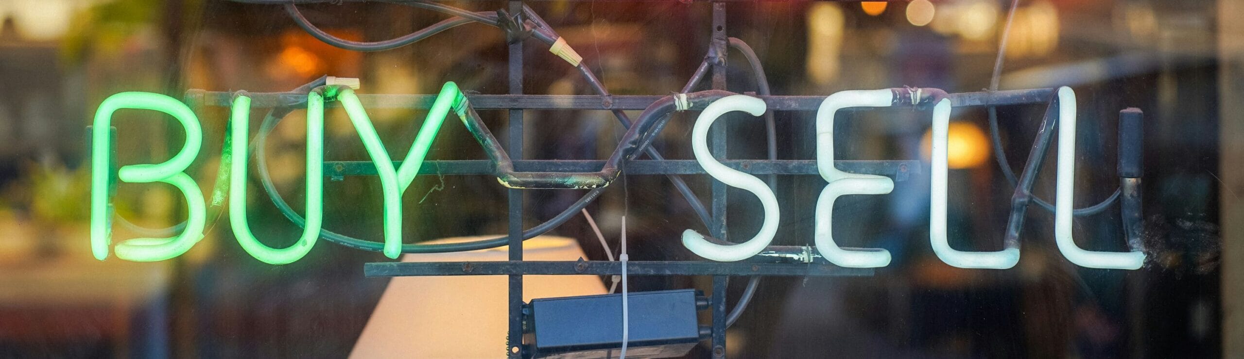 sign that reads buy sell