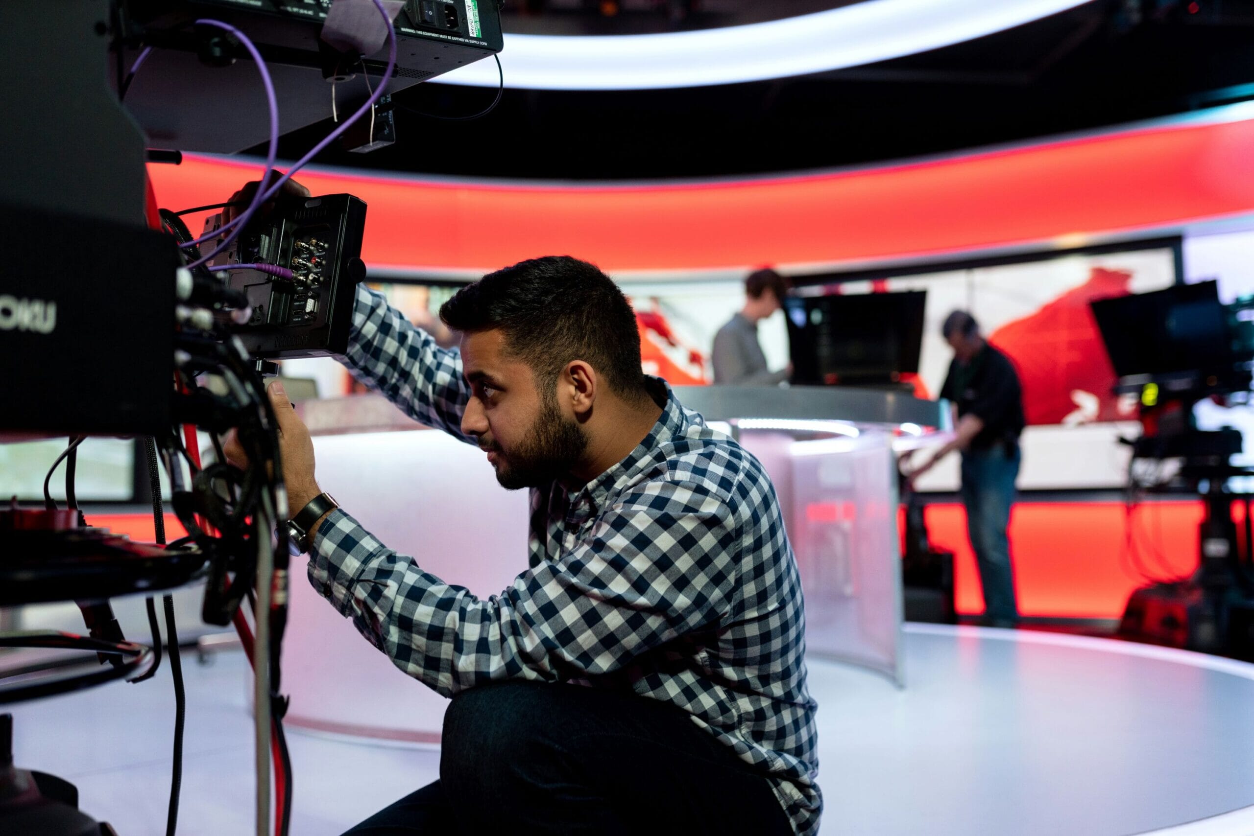 man-using-camera-bbc-news-scaled