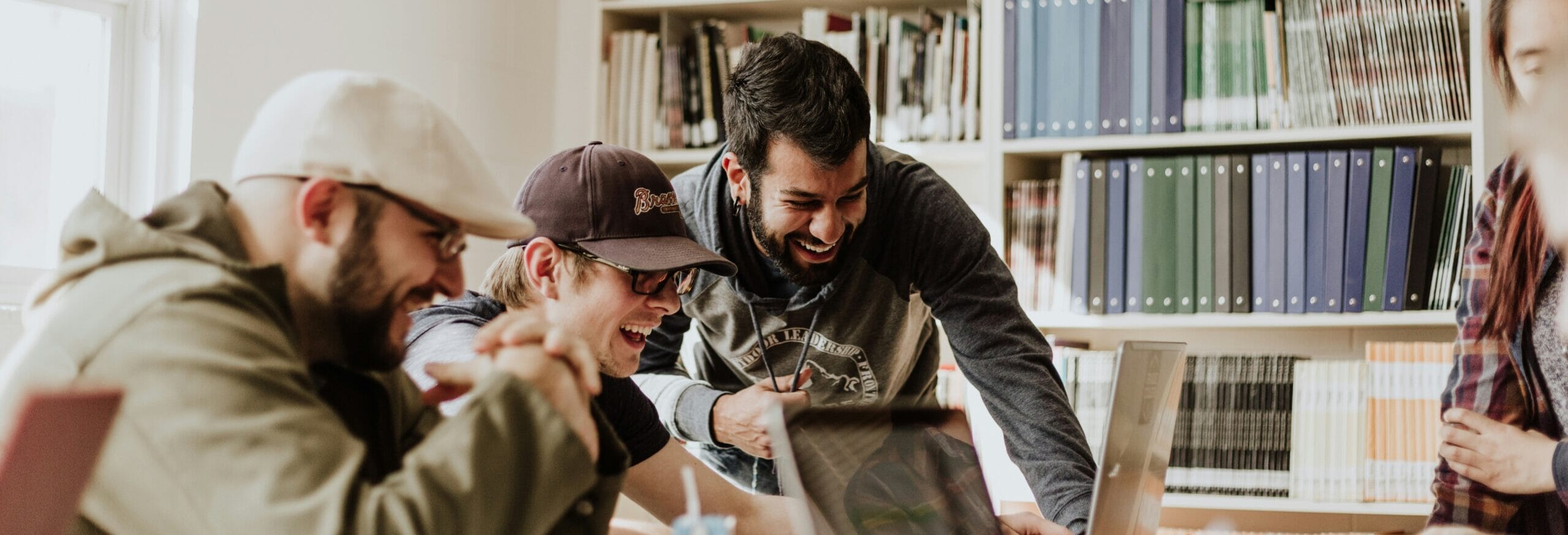 people-laughing-working-scaled