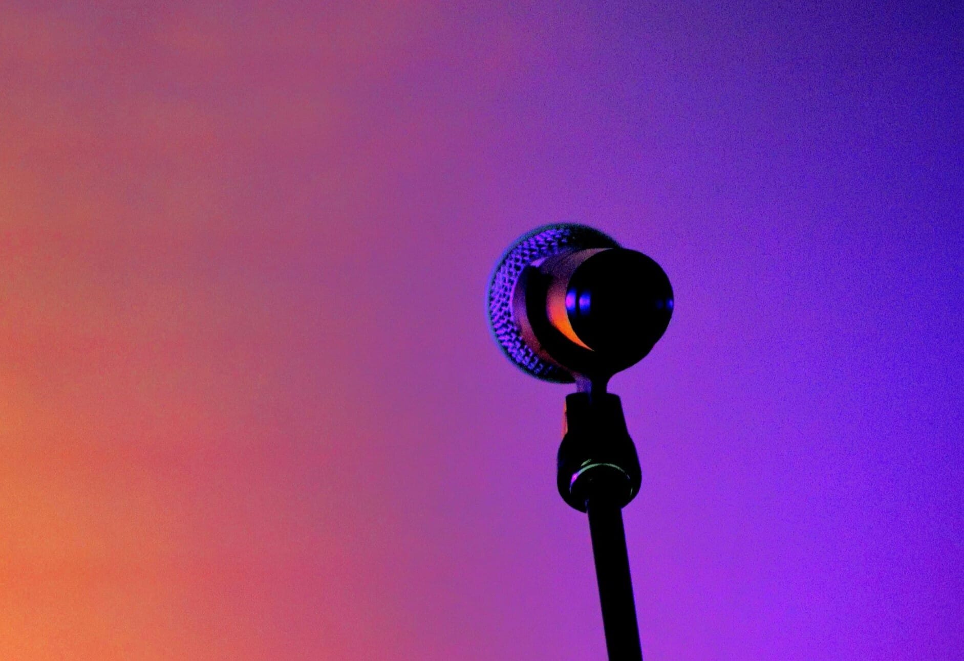 microphone with a purple and orange background