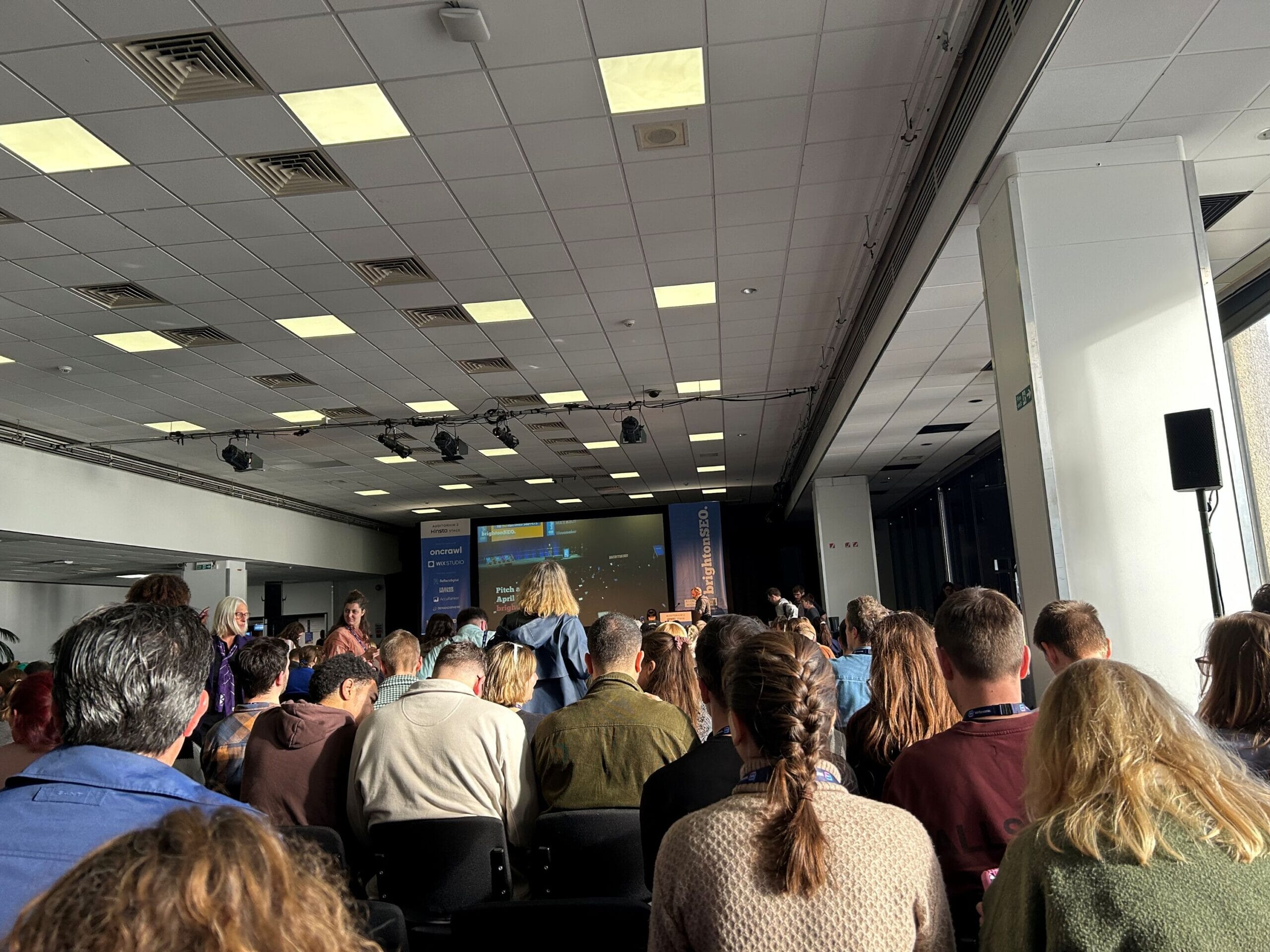 people sat down watching a talk at brightonseo